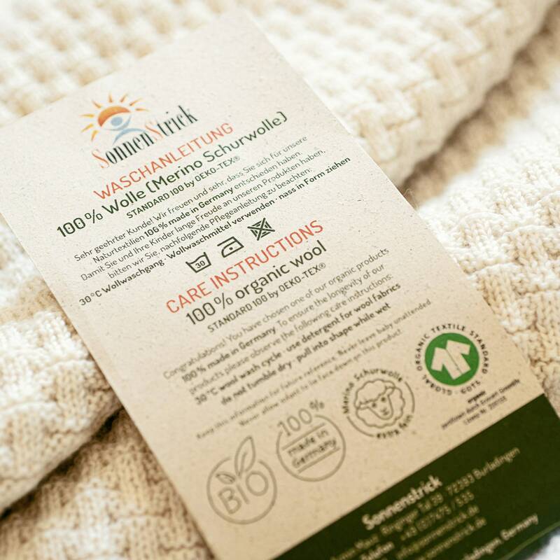 Foto der Pflegeanleitung von Sonnenstrick auf Graspapier